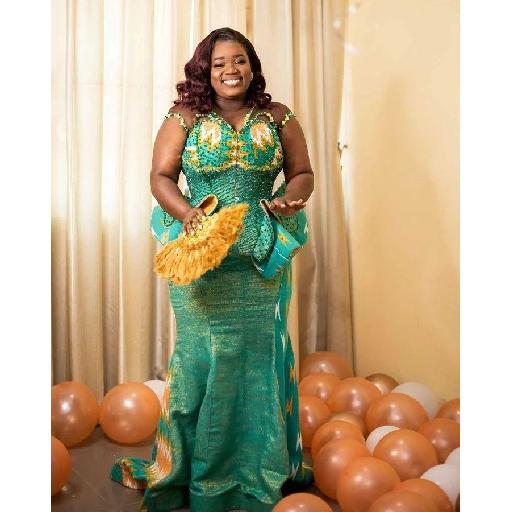 Amoasi Woman in Beautiful Beaded Kente