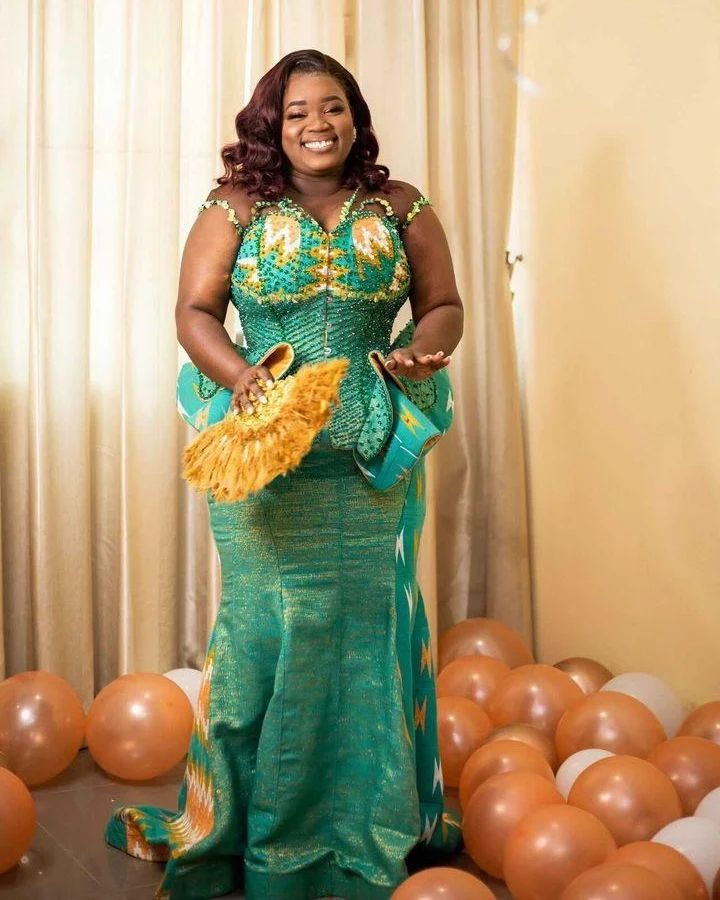 Amoasi Woman in Beautiful Beaded Kente