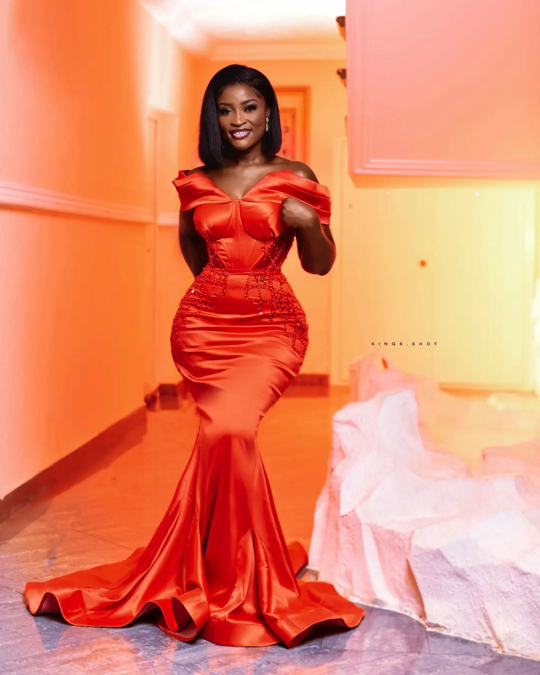 Radiant Red Elegance: Unveiling Stunning Amoasi Official Fashion