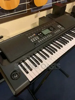 Korg EK-50 61-key Arranger Keyboard With Bag Stand | Touch-Sensitive Keys | Built-in Rhythms & Voices | USB MIDI Compatible