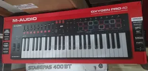 M-Audio Oxygen Pro 49 – 49-Key USB MIDI Controller – Velocity-Sensitive Pads, Faders & Smart Controls