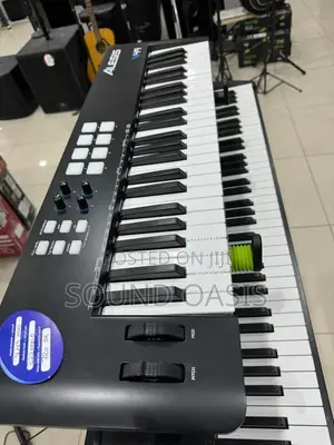 Alesis V49 - 49 Key USB MIDI Keyboard Controller | Touch-Sensitive Keys | Built-in Voices & Rhythms | Beginner to Pro