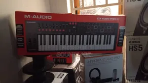 M-Audio Oxygen Pro 49 – 49-Key USB MIDI Controller – Velocity-Sensitive Pads, Faders & Smart Controls