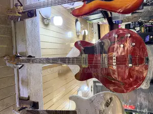 Fender Electric Bass Guitar – Transparent Cherry Finish, Solid Body & Reliable Stage-Ready Build