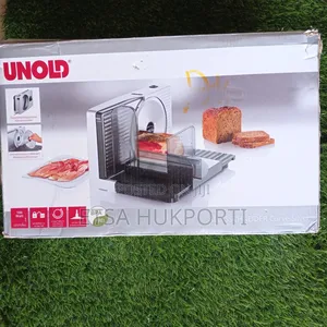 Brand New Meat/Bread Curved Slicer From Germany | Stainless Steel Blade | Adjustable Thickness | Safety Guard | Electric | Commercial Bakery Grade | Fairly Used – Excellent Condition