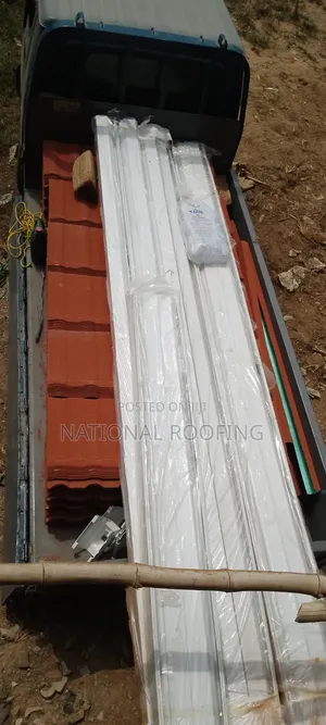 Installation of Rain Gutter and Stone Coated Roofing Sheet | UV-Resistant | Weatherproof | 0.35–0.55mm Gauge | 50-Year Warranty | Residential & Commercial Grade
