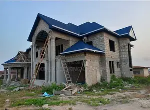 Blue-Black Colored Euro Roofing Tiles Project | UV-Resistant | Weatherproof | 0.35–0.55mm Gauge | 50-Year Warranty | Residential & Commercial Grade